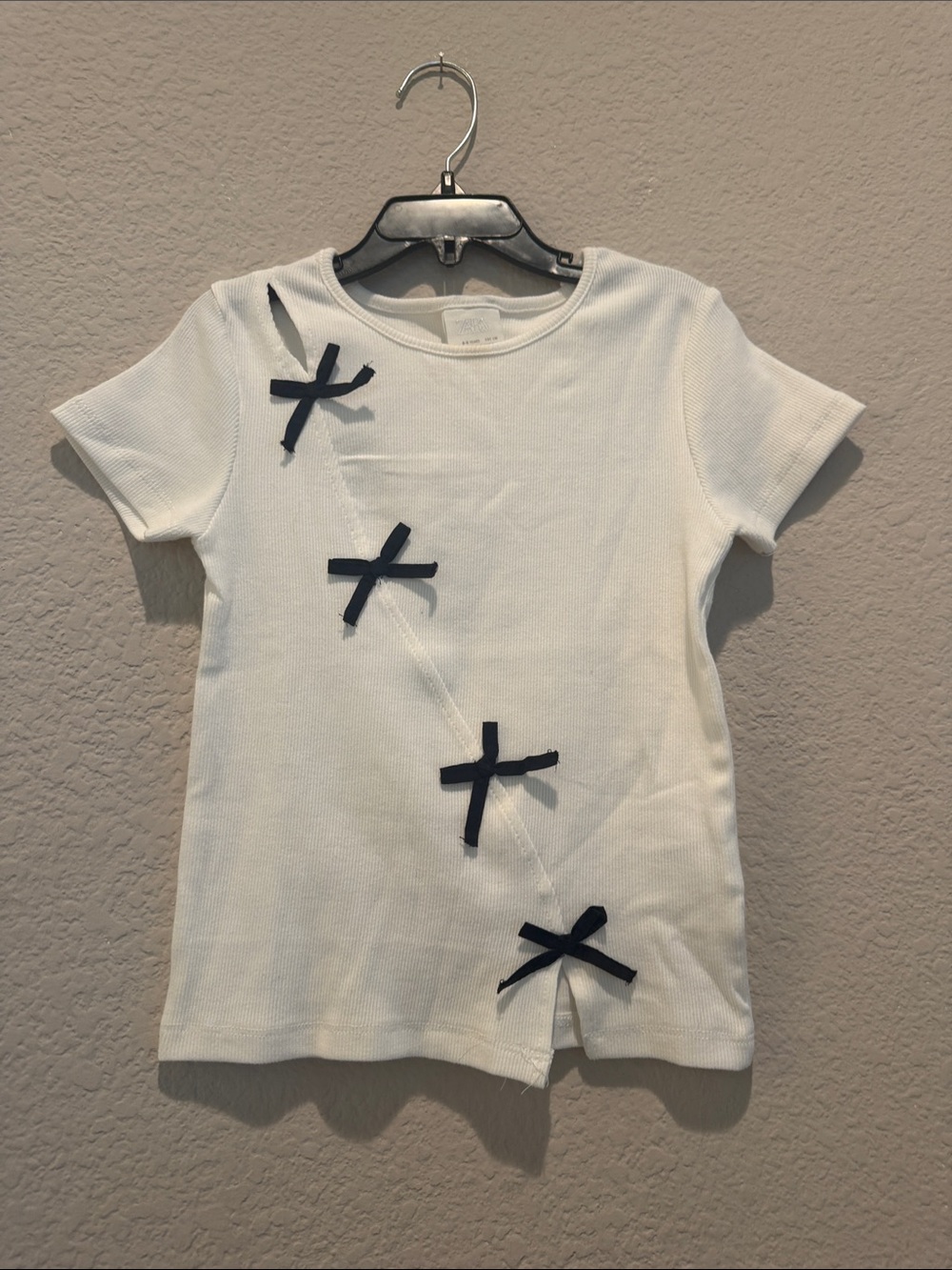 White Girls' Short Sleeve Tee with Black Bow Accents